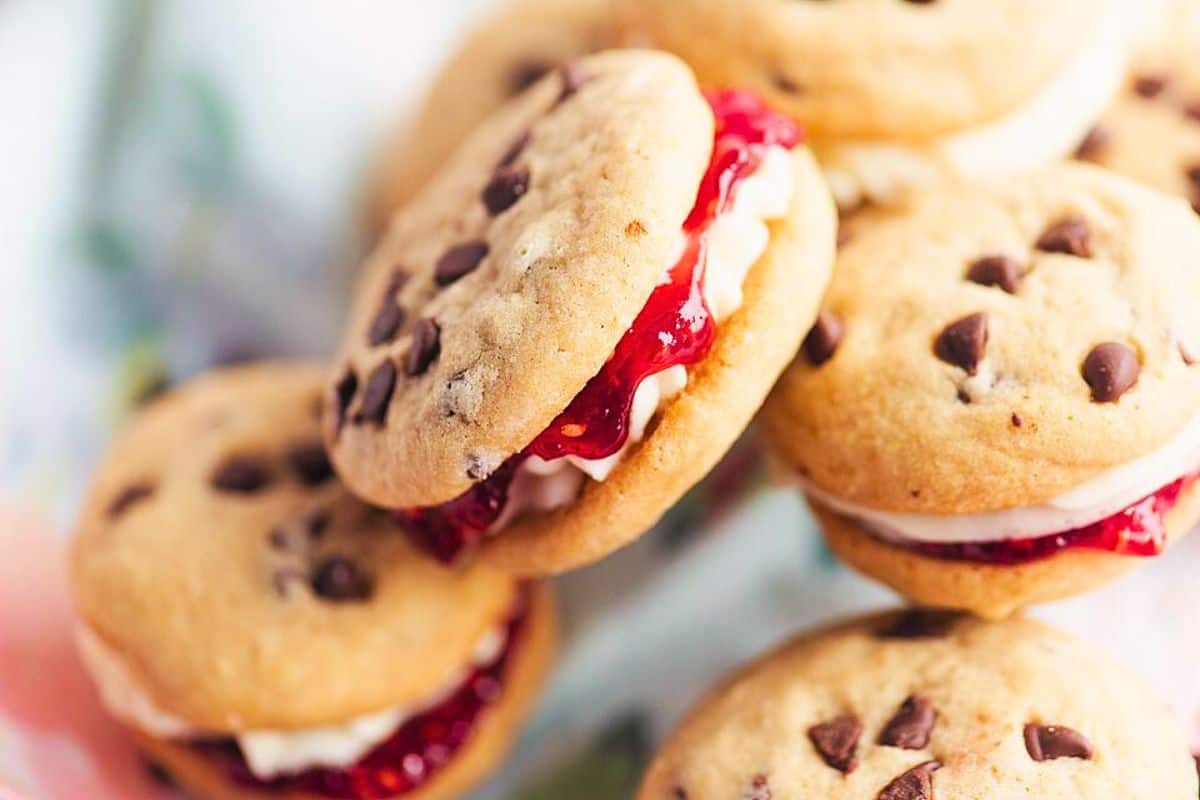 Chocolate chip buttercream jam sandwich cookies.
