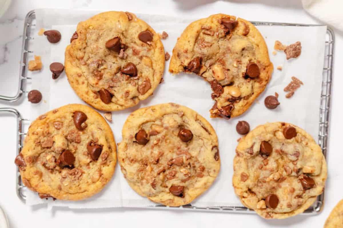 Toffee chocolate chip cookies on a tray.