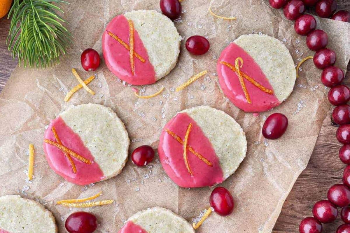 Orange shortbread cookies with cranberry glaze.