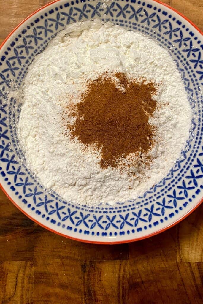 Crumbl Snickerdoodle Cupcake Cookie ingredients in a bowl