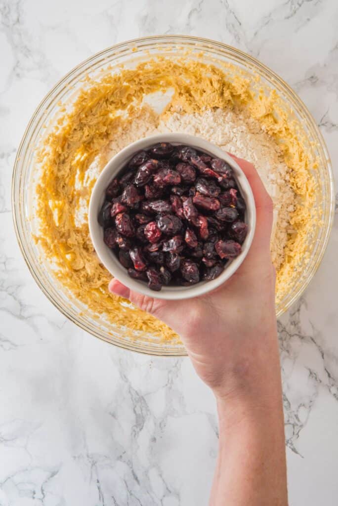 Add chopped blueberries to wet mixture of Cranberry Orange Cookies in a bowl