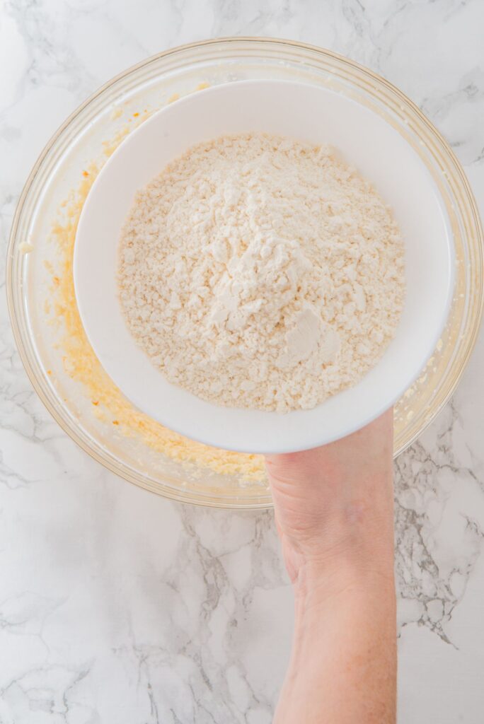 Add flour to Easter Cookies wet ingredients