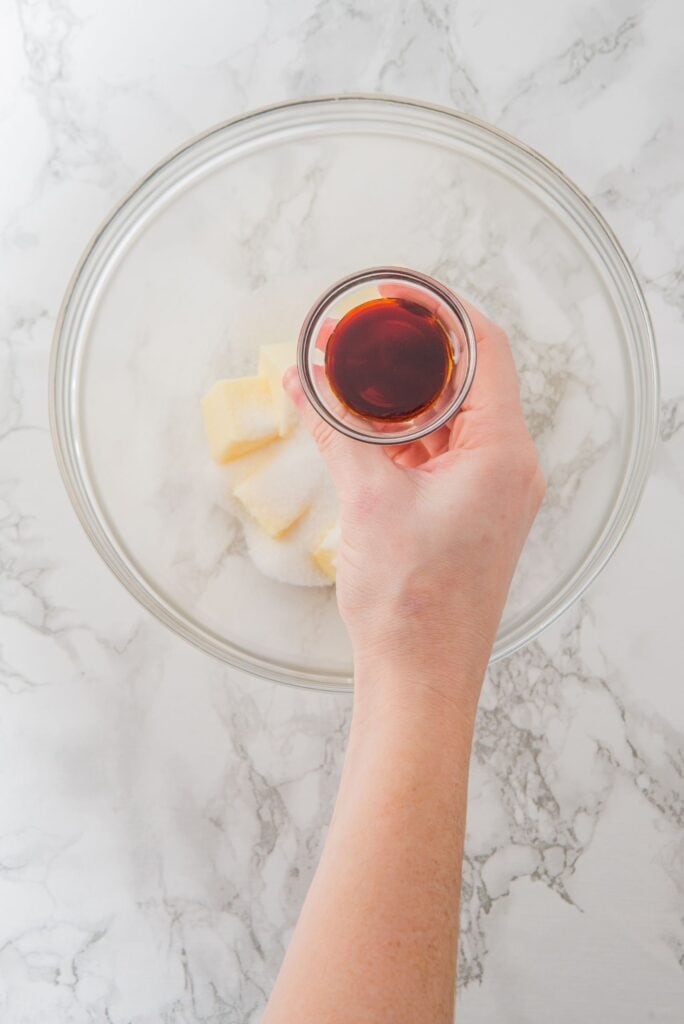 Adding vanilla extract to a large bowl