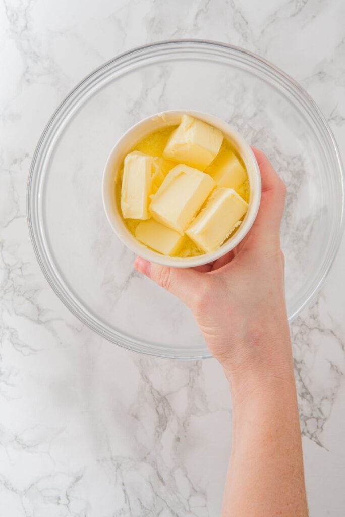 Add butter to large bowl